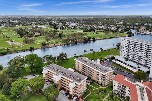 bird's eye view featuring a water view and view of golf course