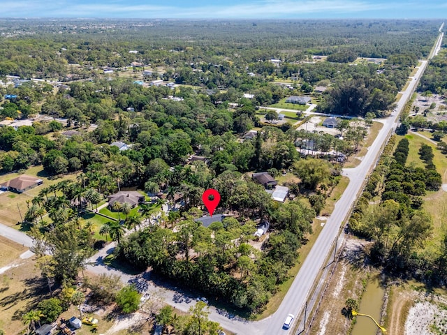 bird's eye view featuring a forest view