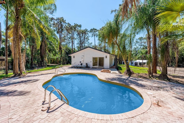 outdoor pool featuring a patio area
