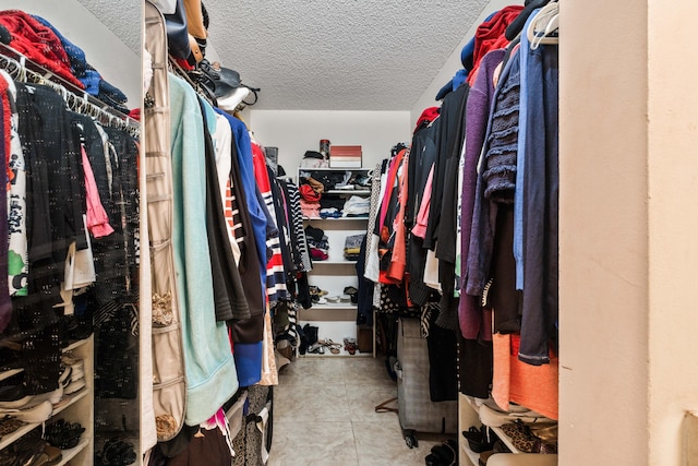 walk in closet featuring tile patterned floors