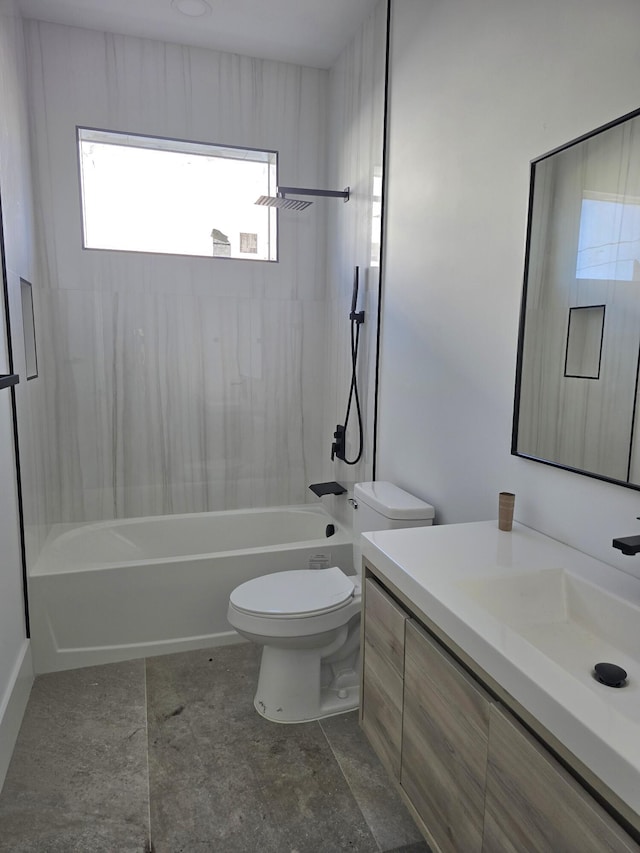 bathroom featuring vanity, toilet, and shower / bathtub combination