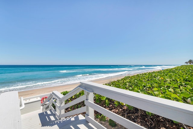 view of water feature with a beach view