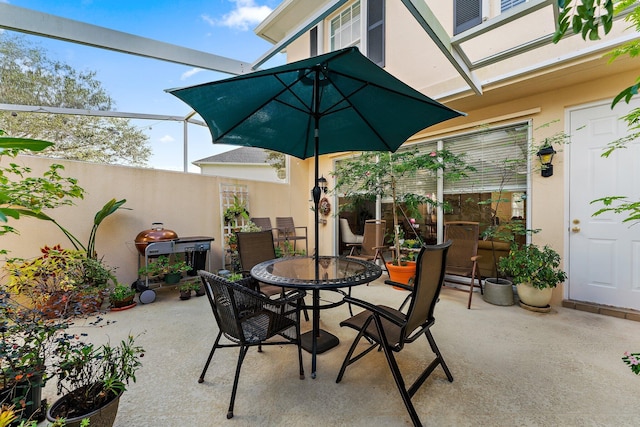 view of patio featuring outdoor dining space