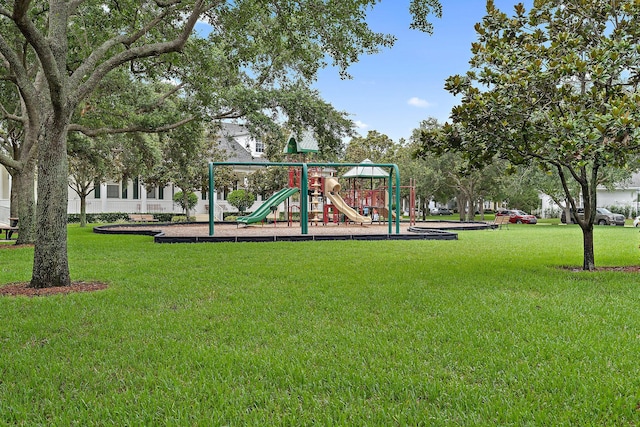 community play area with a lawn