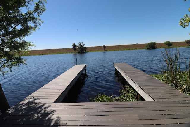 view of dock with a water view