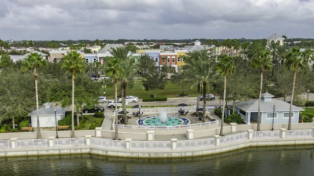 surrounding community with a water view