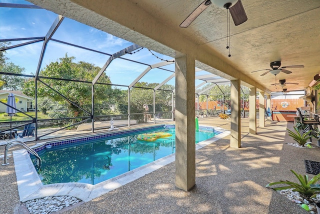 10476 SW 52nd St, Cooper City, FL 33328 - outdoor pool featuring ceiling fan, a patio, and a lanai