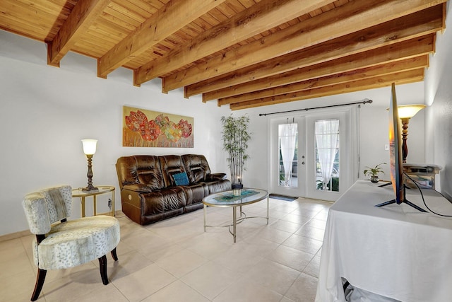 living area featuring french doors, beam ceiling, and wooden ceiling