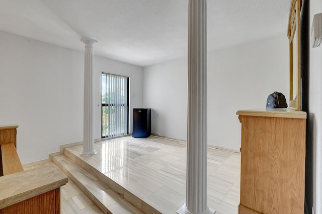 10476 SW 52nd St, Cooper City, FL 33328 - interior space featuring ornate columns and light tile patterned floors