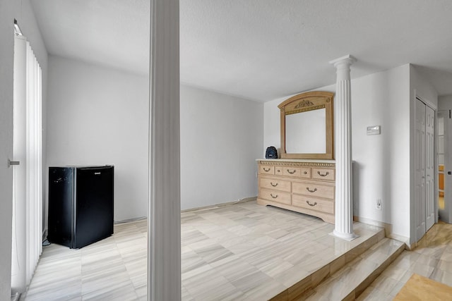 10476 SW 52nd St, Cooper City, FL 33328 - bedroom featuring decorative columns and freestanding refrigerator