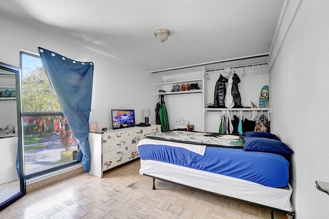 bedroom with a textured ceiling