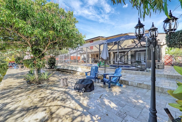 10476 SW 52nd St, Cooper City, FL 33328 - view of patio with a pool and glass enclosure