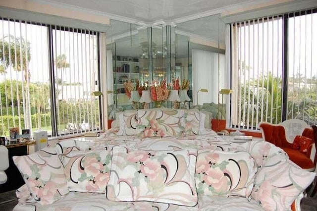 bedroom with ornamental molding