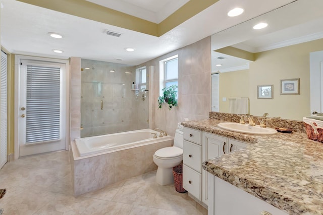 bathroom with visible vents, crown molding, walk in shower, a bathtub, and vanity