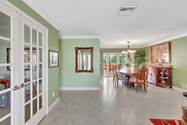 dining room featuring visible vents, an inviting chandelier, light tile patterned flooring, ornamental molding, and french doors