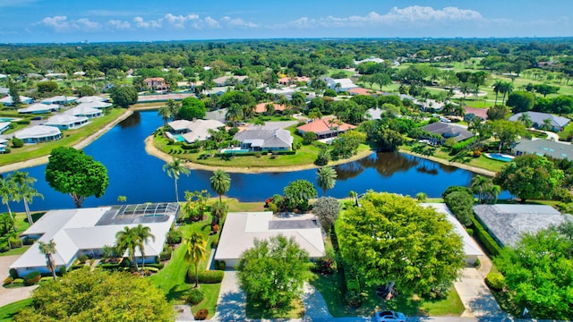 aerial view with a residential view and a water view