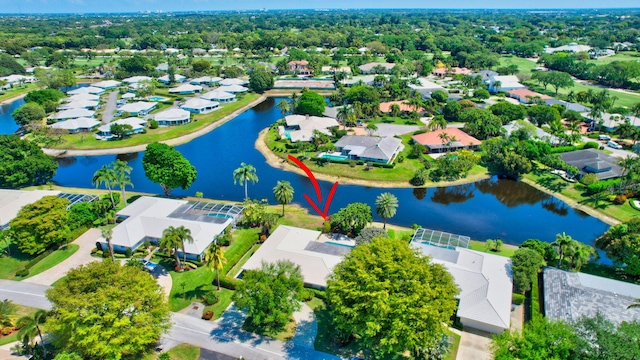 aerial view with a residential view and a water view