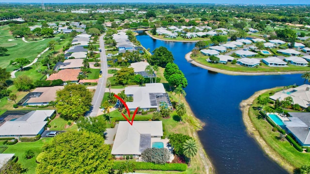 birds eye view of property featuring a residential view and a water view