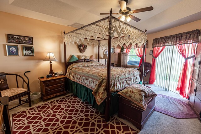 6496 NW Groveland Ter, Port Saint Lucie, FL 34986 - carpeted bedroom featuring ceiling fan, lofted ceiling, and access to outside