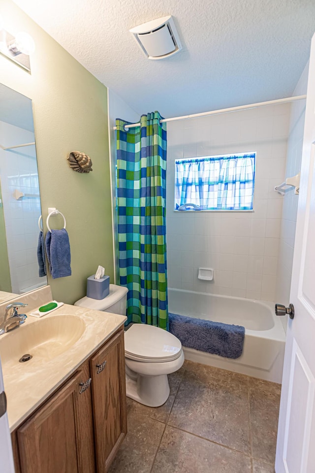 6496 NW Groveland Ter, Port Saint Lucie, FL 34986 - full bathroom with a textured ceiling, vanity, shower / tub combo, and toilet