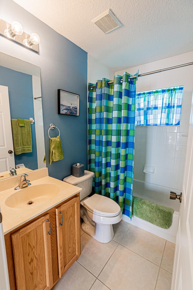 6496 NW Groveland Ter, Port Saint Lucie, FL 34986 - bathroom featuring tile patterned flooring, visible vents, toilet, a shower with shower curtain, and vanity