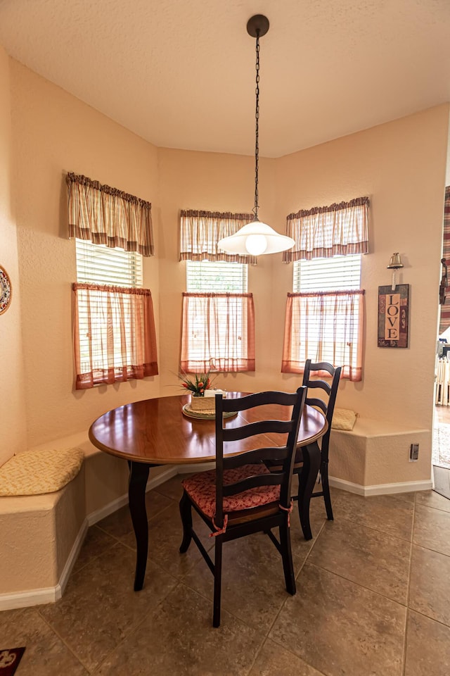6496 NW Groveland Ter, Port Saint Lucie, FL 34986 - dining area with baseboards