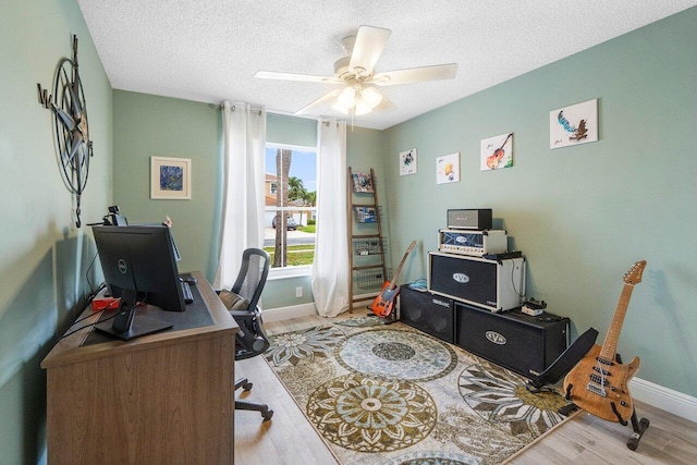6346 Sand Hills Cir, Lake Worth, FL 33463 - office featuring baseboards, wood finished floors, ceiling fan, and a textured ceiling