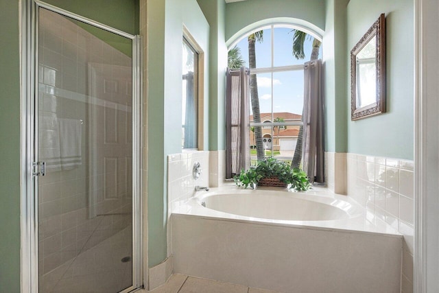 6346 Sand Hills Cir, Lake Worth, FL 33463 - bathroom with tile patterned floors, a shower stall, and a bath