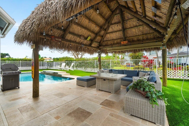 6346 Sand Hills Cir, Lake Worth, FL 33463 - view of patio with an outdoor living space, a fenced in pool, a gazebo, area for grilling, and a fenced backyard