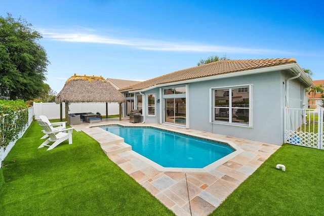 6346 Sand Hills Cir, Lake Worth, FL 33463 - view of pool featuring a fenced backyard, a gazebo, an outdoor living space, a yard, and a patio area