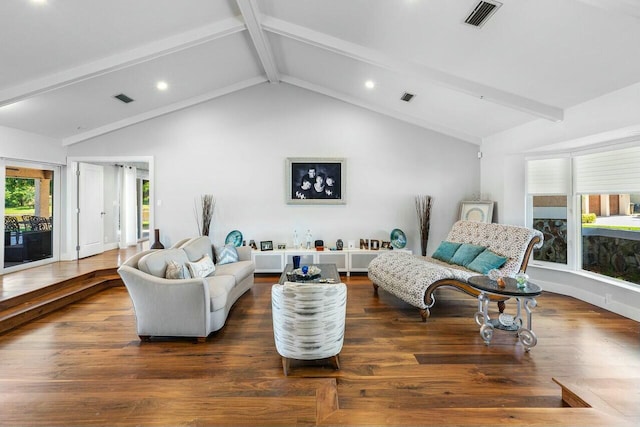 living room featuring wood finished floors and visible vents