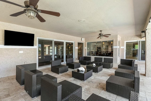 view of patio / terrace featuring outdoor lounge area and ceiling fan