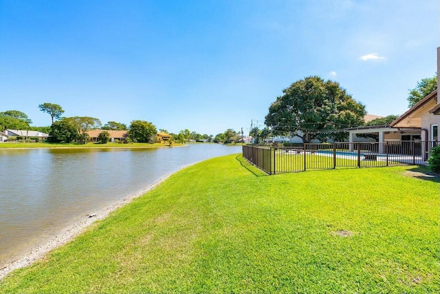 view of water feature with fence