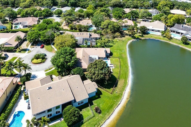 aerial view with a water view and a residential view