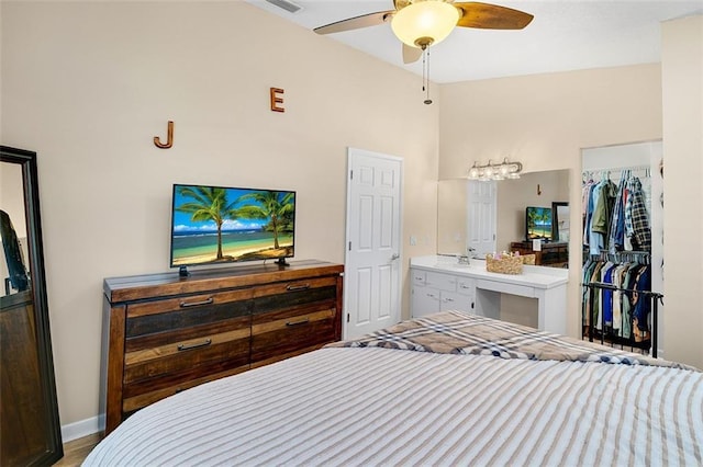 bedroom with baseboards and ceiling fan