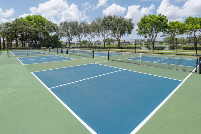 view of sport court with community basketball court and fence