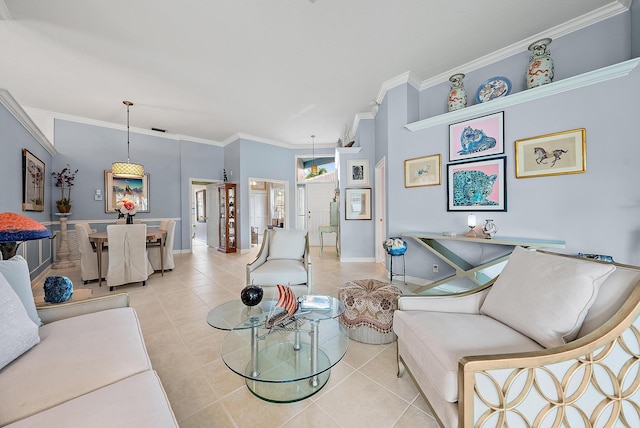 living area featuring baseboards, ornamental molding, and light tile patterned floors
