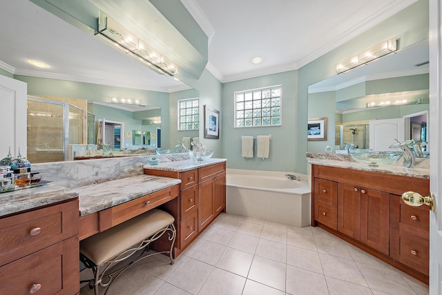 full bath featuring tile patterned flooring, crown molding, a stall shower, two vanities, and a bath