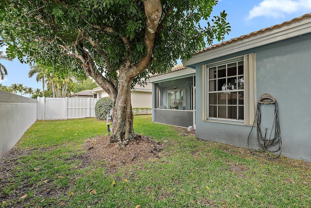 view of yard with a fenced backyard