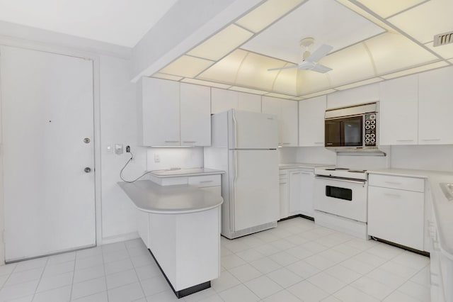 4545 N Ocean Blvd Unit 10C, Boca Raton, FL 33431 - kitchen featuring white appliances, ceiling fan, light countertops, and white cabinets