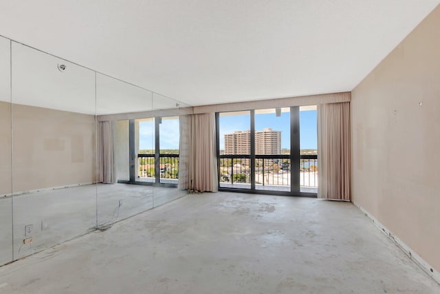 4545 N Ocean Blvd Unit 10C, Boca Raton, FL 33431 - unfurnished room with unfinished concrete flooring and baseboards