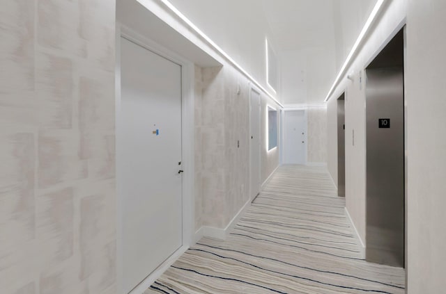 4545 N Ocean Blvd Unit 10C, Boca Raton, FL 33431 - corridor with elevator and baseboards