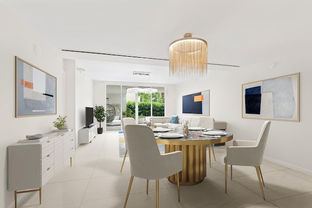 dining area with light tile patterned floors and baseboards