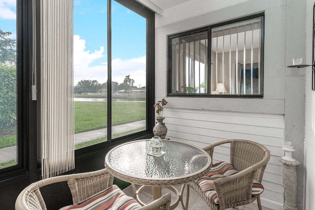 15469 Lakes Of Delray Blvd Unit 103, Delray Beach, FL 33484 - sunroom / solarium with healthy amount of natural light and a water view