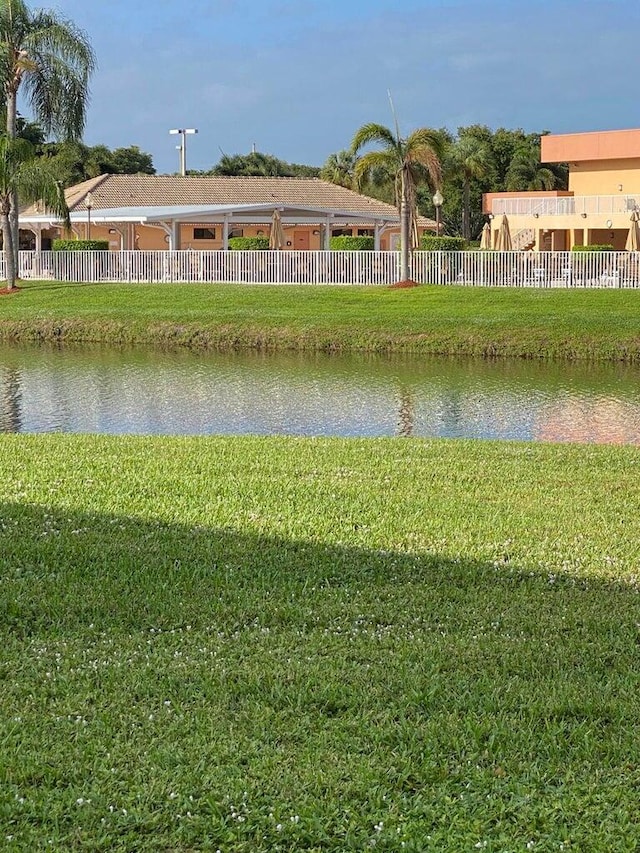 view of water feature featuring fence