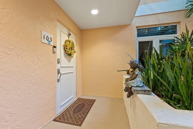309 E Ocean Ave Unit 103, Lantana, FL 33462 - entrance to property with stucco siding