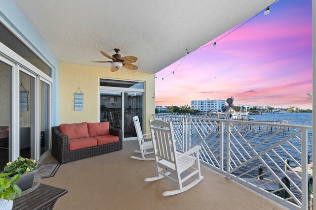 309 E Ocean Ave Unit 103, Lantana, FL 33462 - balcony with a water view and a ceiling fan