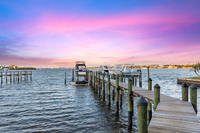 309 E Ocean Ave Unit 103, Lantana, FL 33462 - view of dock featuring a water view and boat lift