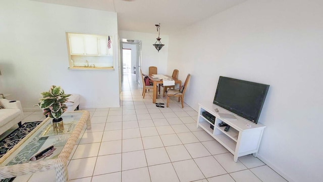 living room with light tile patterned floors