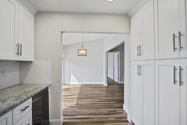 kitchen with wine cooler, dark wood finished floors, light stone countertops, and white cabinetry